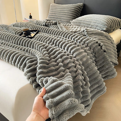 Solid color thickened wide striped multifunctional blanket