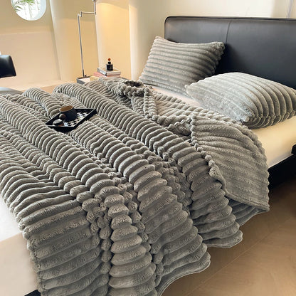 Solid color thickened wide striped multifunctional blanket